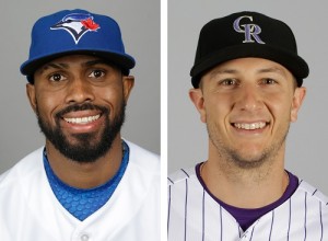 FILE - These are 2015, file photos showing Toronto Blue Jays' Jose Reyes, left, and Colorado Rockies' Troy Tulowitzki, right. Tulowitzki was sent to the Toronto Blue Jays for Jose Reyes and three pitching prospects late Monday night, July 27, 2015, in a stunning swap of star shortstops, according to a person with knowledge of the situation. The person spoke to The Associated Press on condition of anonymity early Tuesday because the deal had not yet been announced. (AP Photo/File)