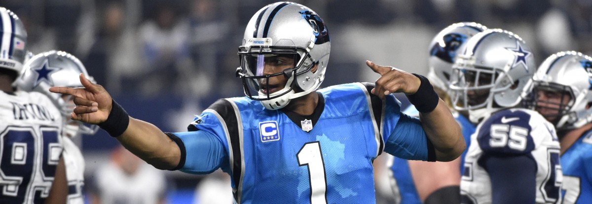 Carolina Panthers quarterback Cam Newton (1) celebrates a first down against the Dallas Cowboys in the second half of an NFL football game, Thursday, Nov. 26, 2015, in Arlington, Texas. The Panthers won 33-14. (AP Photo/Michael Ainsworth)